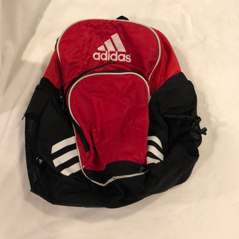 Adidas soccer bag with a lot of compartments and a soccer ball pouch